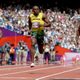 Illustration for article titled Photos Of Usain Bolt Looking Bored As He Blows Past The Best Runners In The World